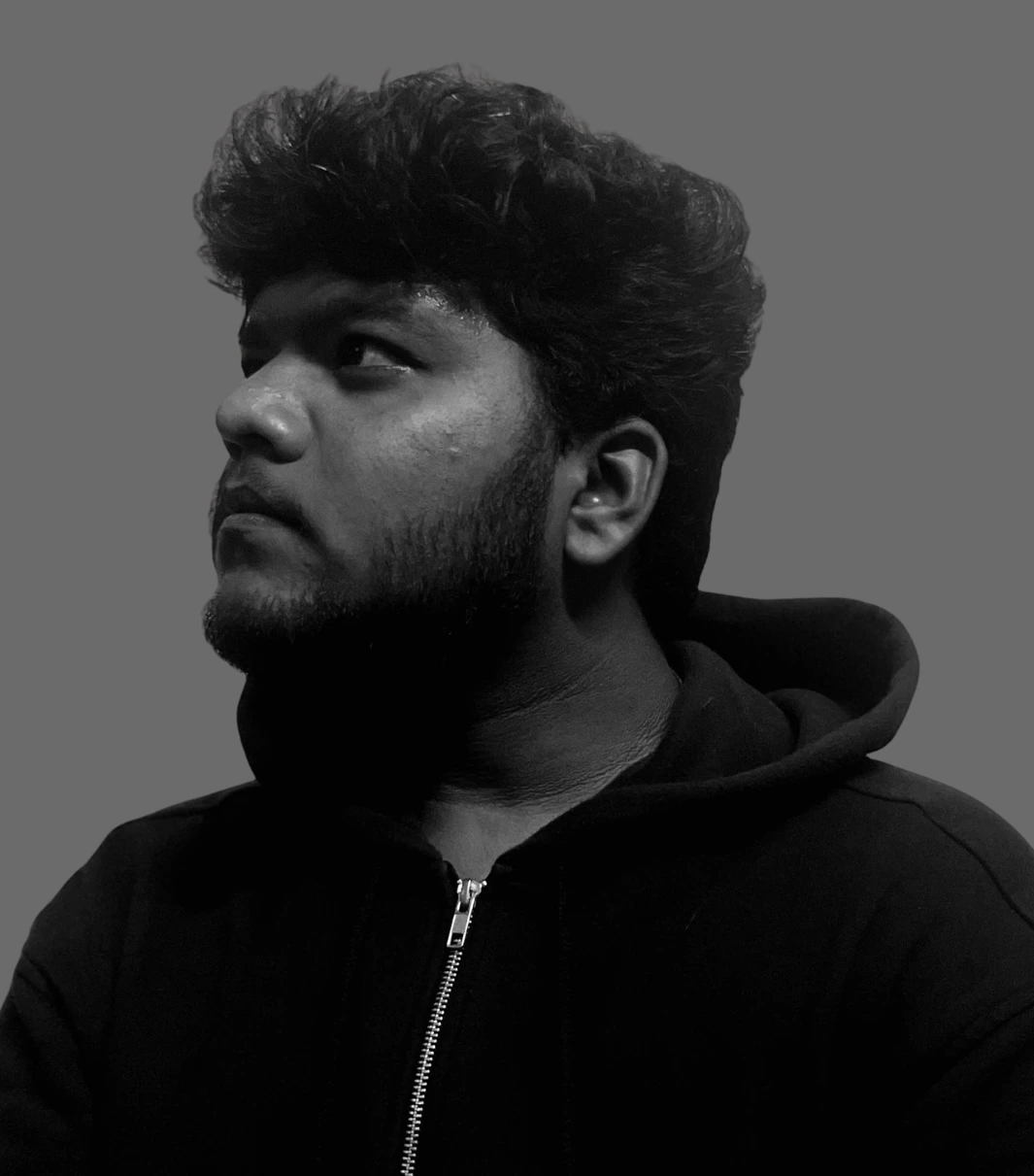 Black-and-white portrait of Sudharsan Baskaran